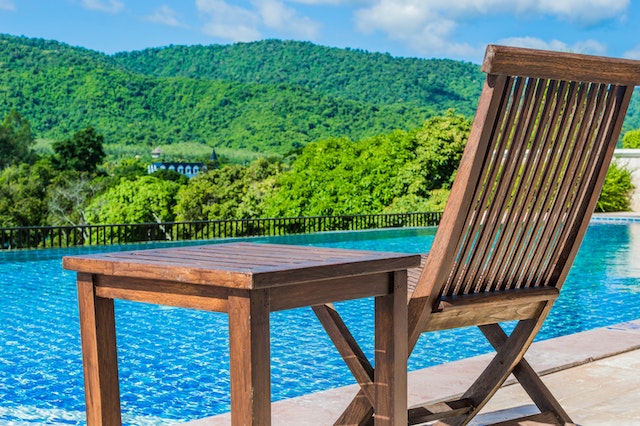 Private terrace seating overlooking the hills